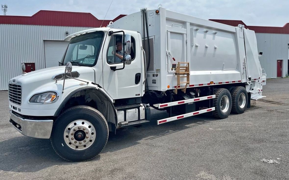 Photo : notre équipe ou nos camions